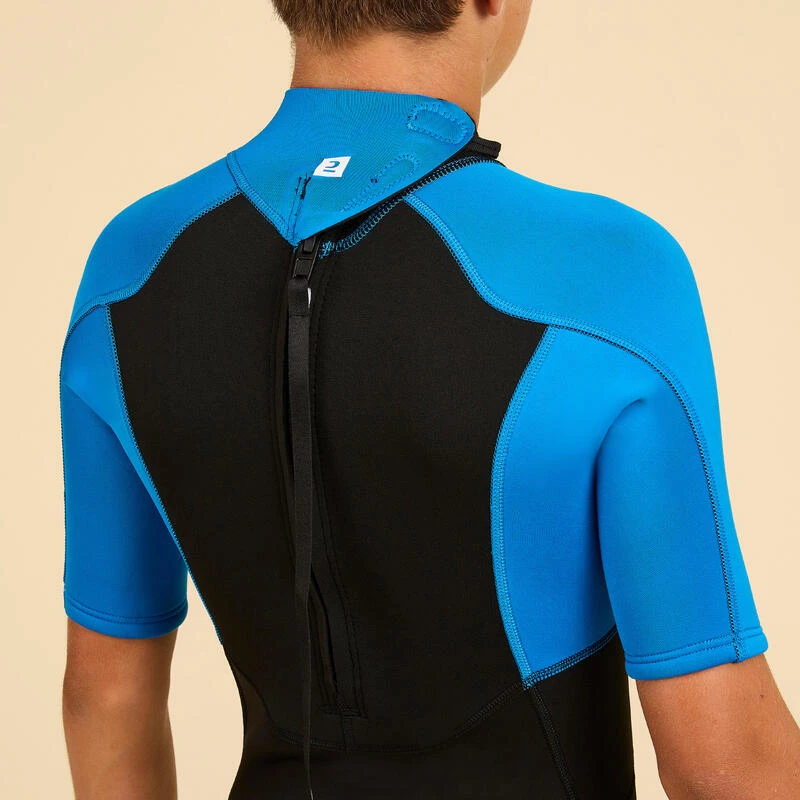 COMBINAISON SURF SHORTY 500 NEOPRENE 1.5MM GARCON BLEUE NOIRE 6 COMBINAISON SURF SHORTY 500 NEOPRENE 1.5MM GARCON BLEUE NOIRE – Image 4